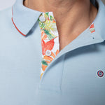 POLO SHIRT PIQUE LIGHT BLUE WITH FLORAL DETAIL